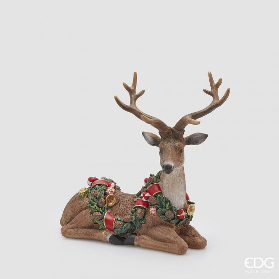 RENNA CON FESTONE SEDUTA